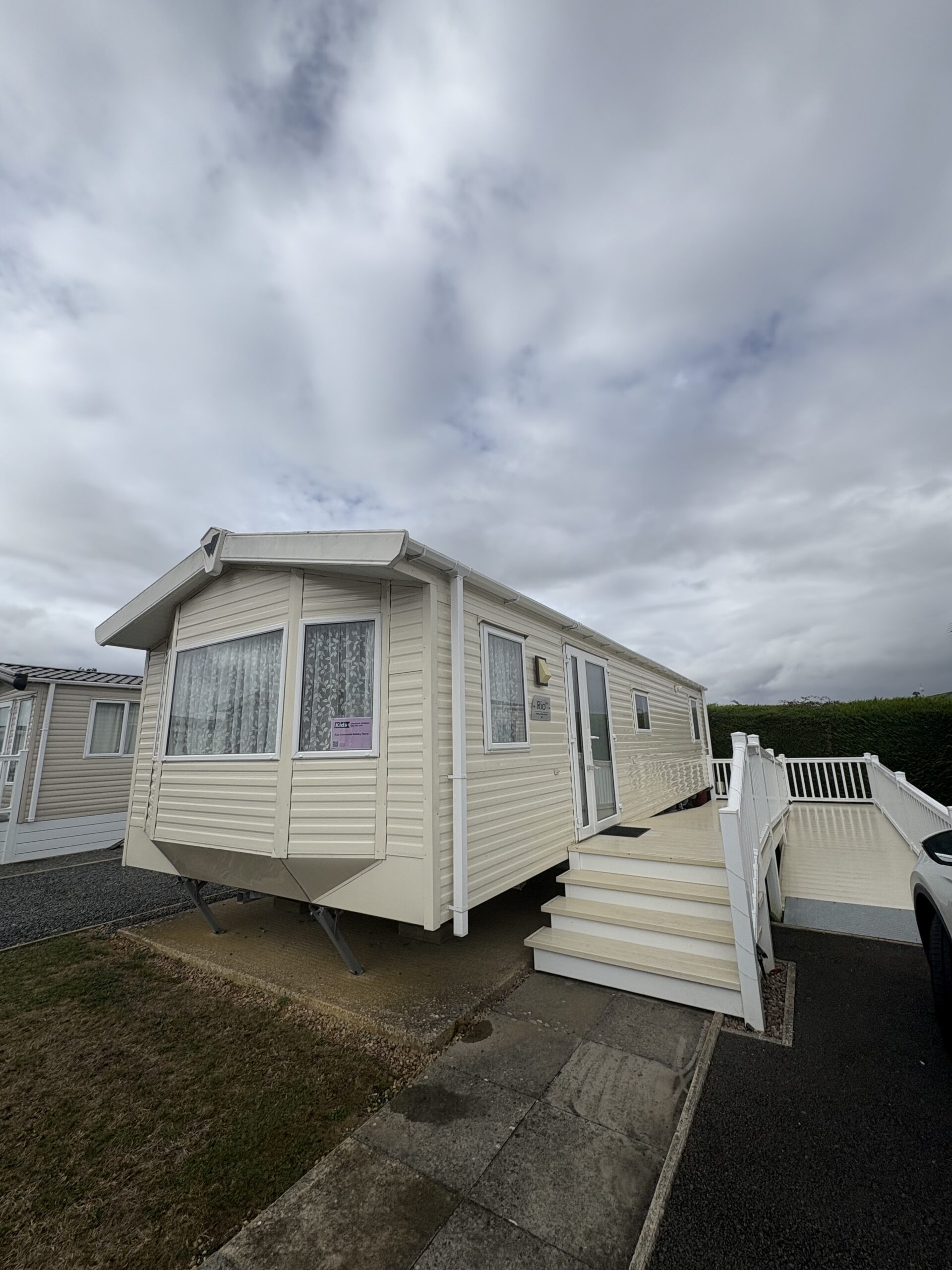 Outside of caravan with a ramp leading to the entrance