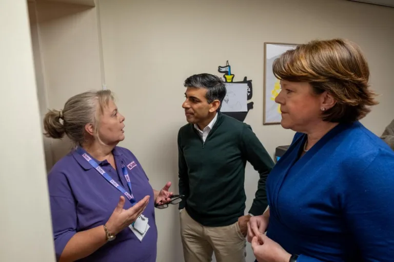 Prime Minister Rishi Sunak and Maria Miller MP talk to staff at Kids' Basingstoke Nursery