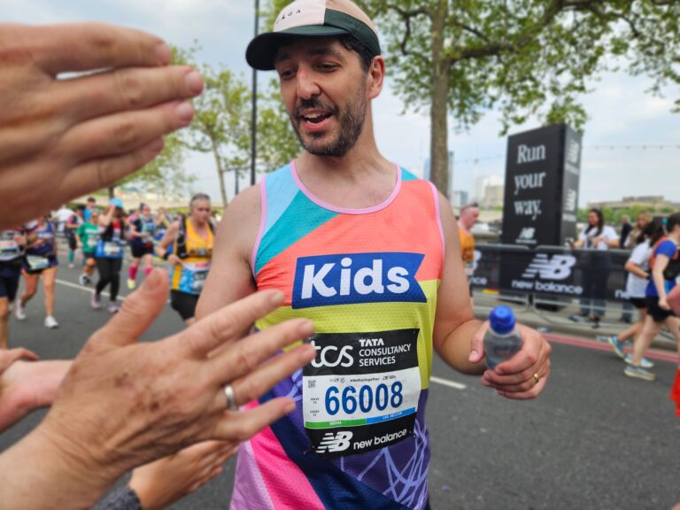 man wearing kids branded vest for london marathon