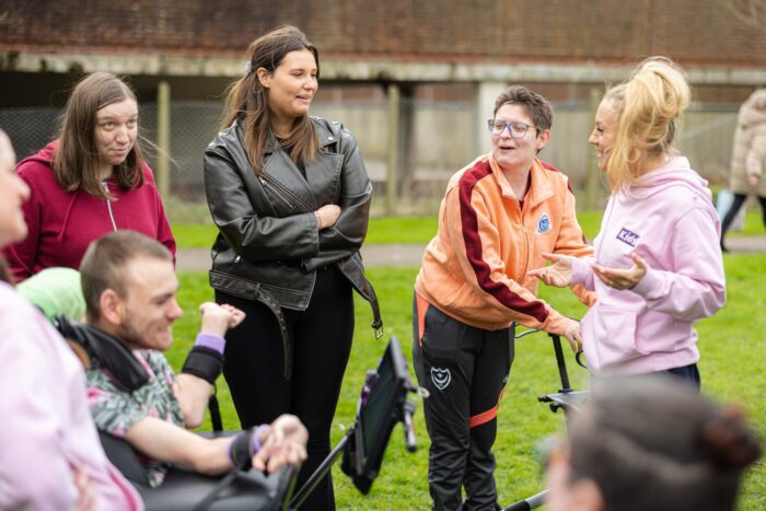 group of young people with SEND chatting