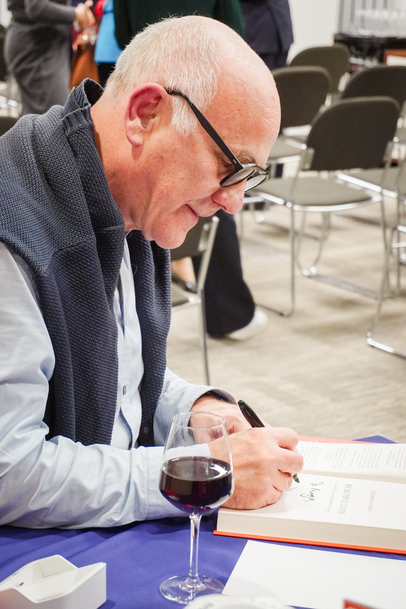 Stephen signing his book