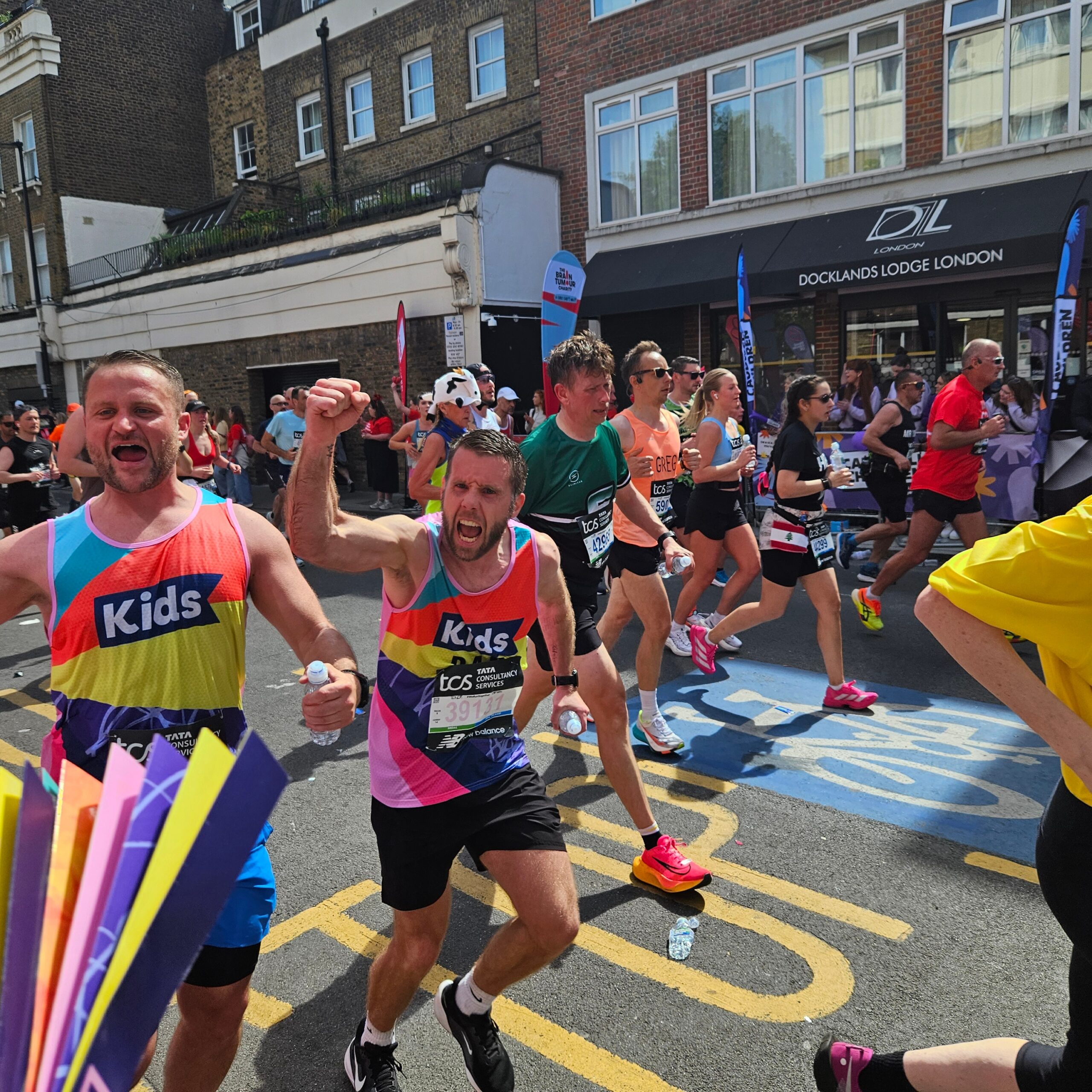 two men running the london marathon for Kids